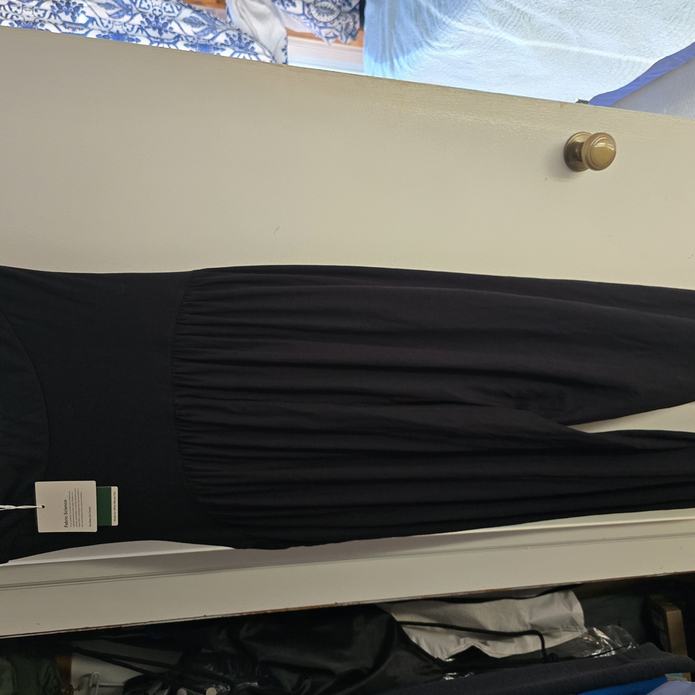 HALARA Black Jumpsuit with Pleated Texture and Flowing Design